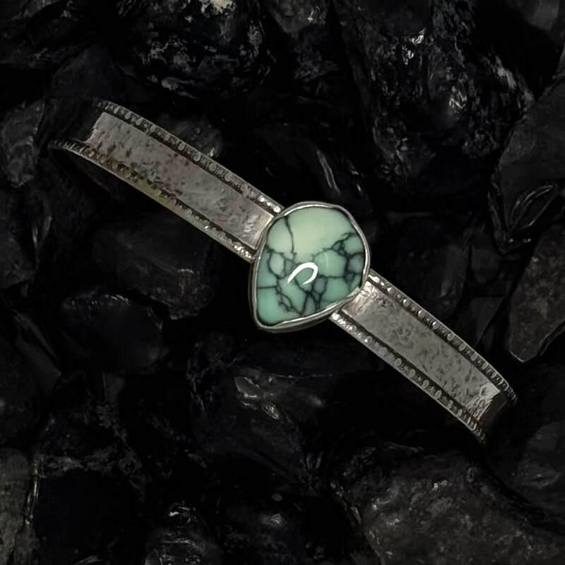 Memoir.
Sterling with Colina Verde Variscite. 7