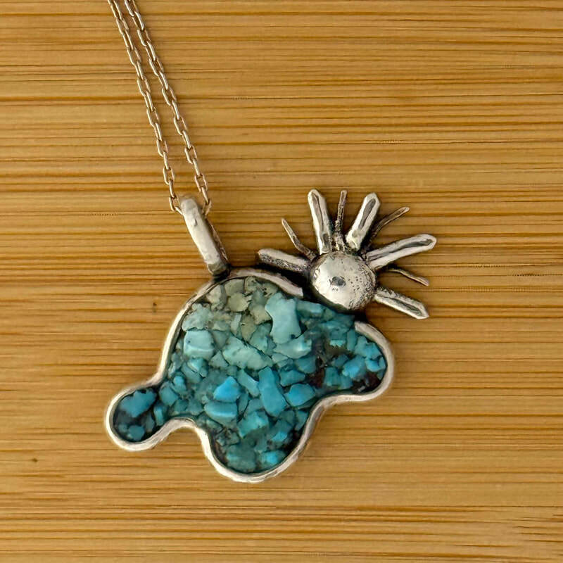 Head in the Clouds.
Sterling with Cloud Chaser Turquoise.  16