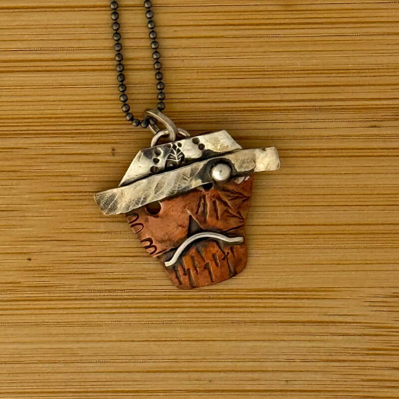 Sterling and copper sugar skull pendant with 16