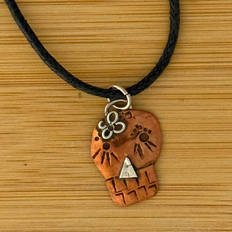 Sterling and copper sugar skull with 18
