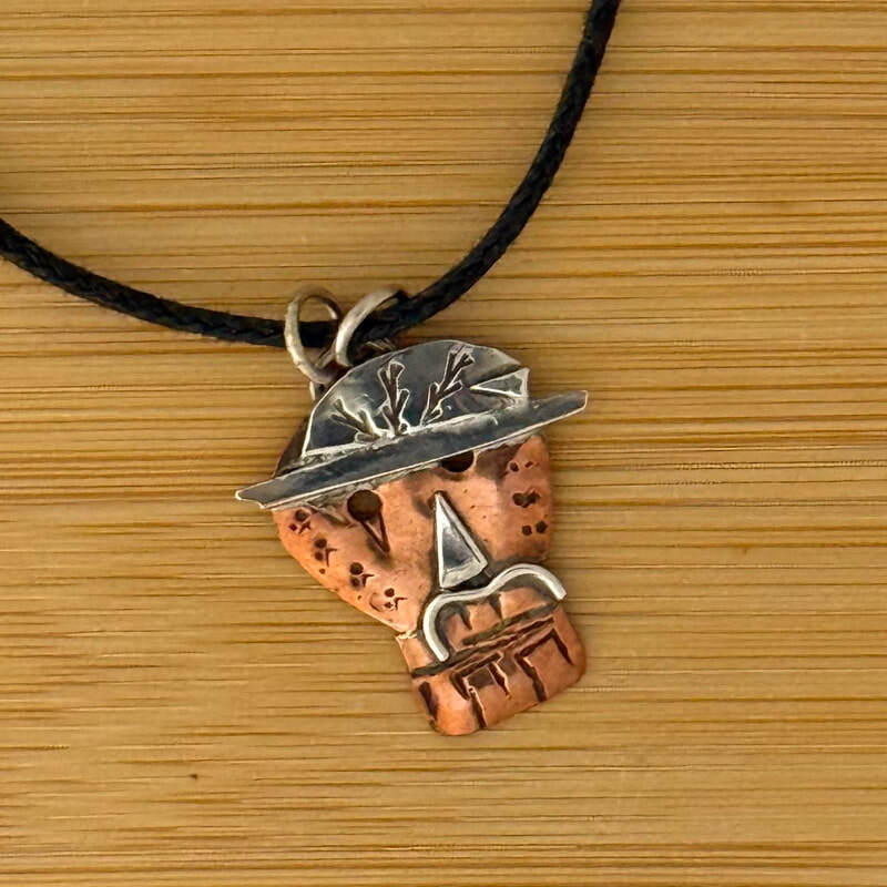 Sterling and copper sugar skull with 20