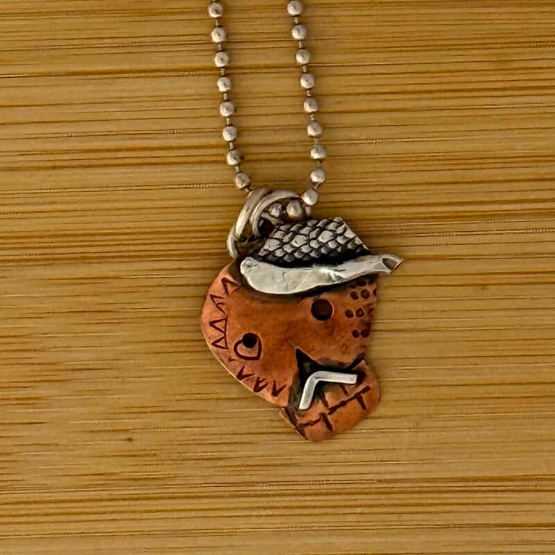 Sterling and copper sugar skull with 20