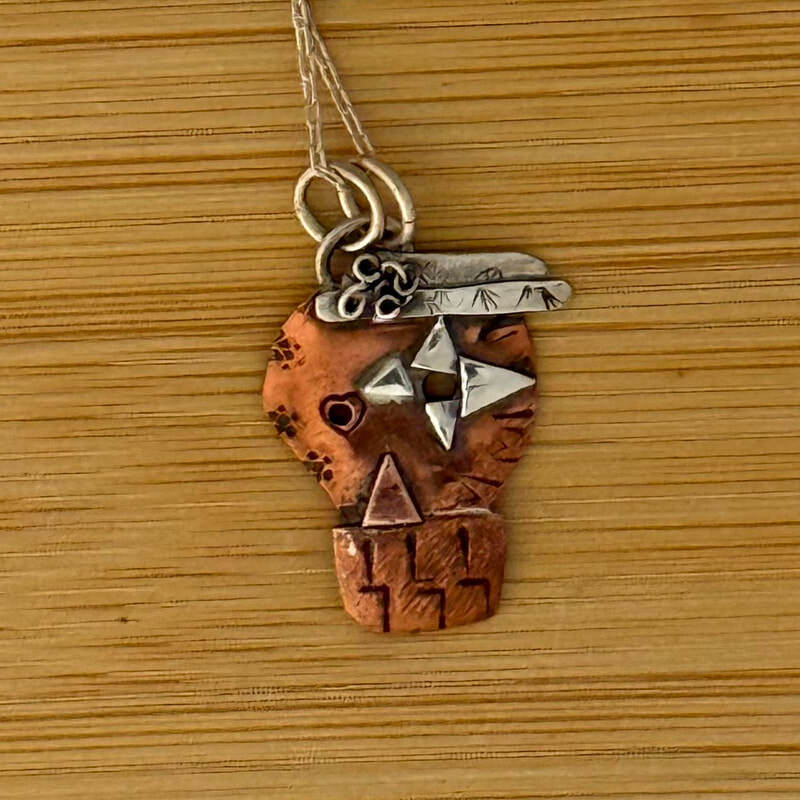Sterling and copper sugar skull with 16'-20