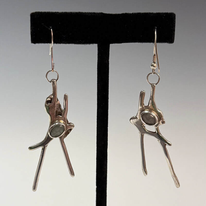 Sterling dangle earrings with aqua stone. $65.00