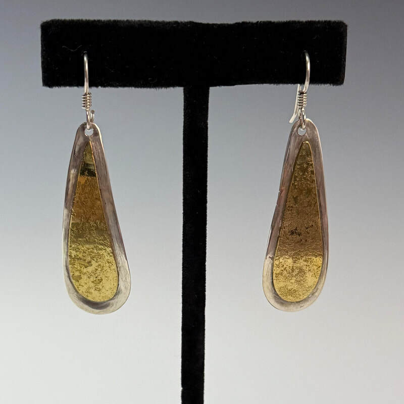 Sterling silver with brass. $45.00
SOLD