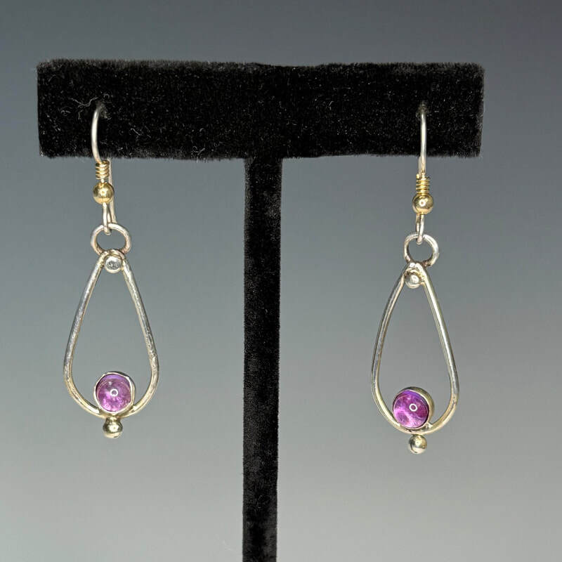 Sterling silver with amethysts. $65.00