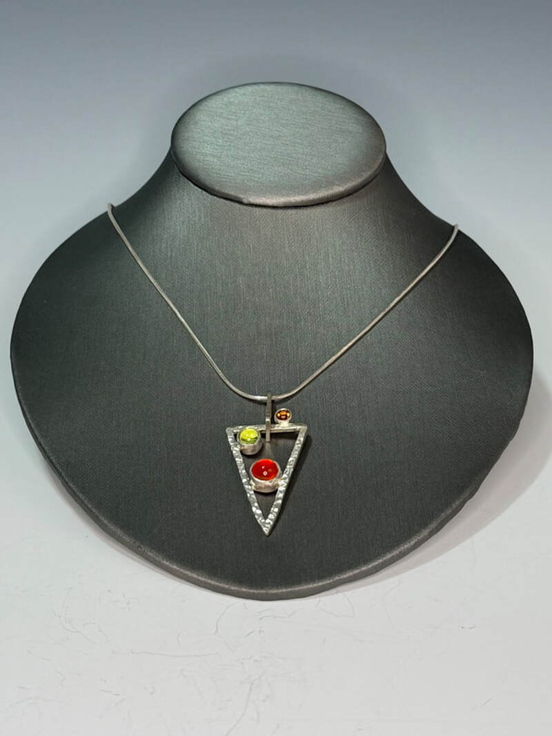 Hammered sterling pendant with carnelian, peridot and yellow sapphire with 18