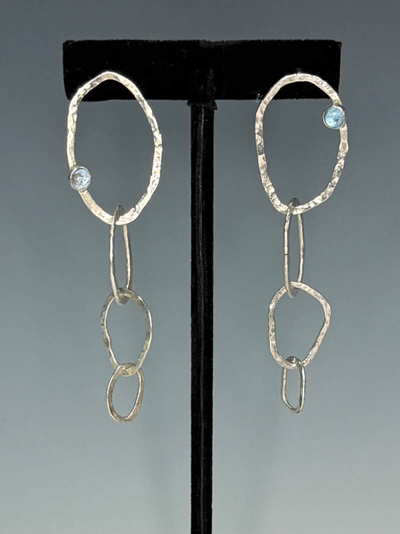 Hammered sterling earrings with aquamarines. 3 1/4